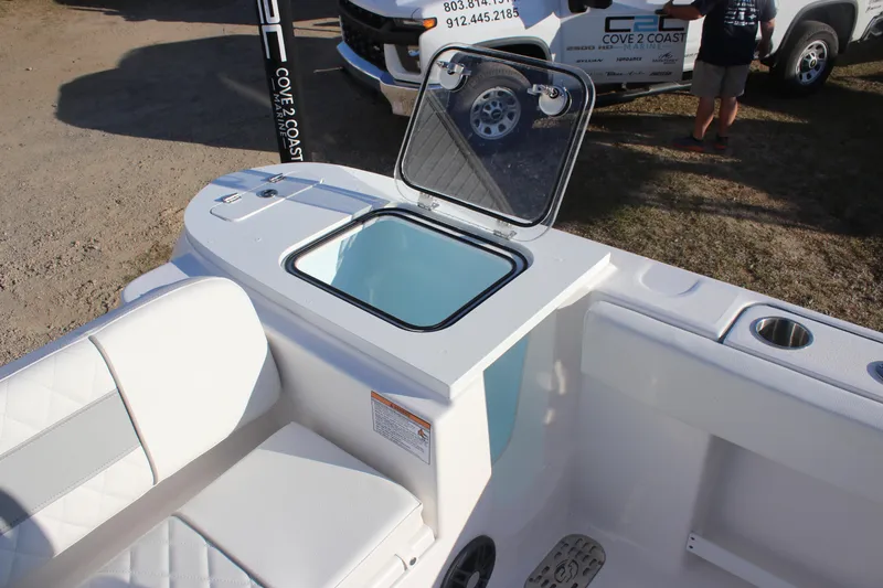 Slide: The Image of 2025 Sea Fox 248 Commander boat interior with open storage compartment and seating. - 8