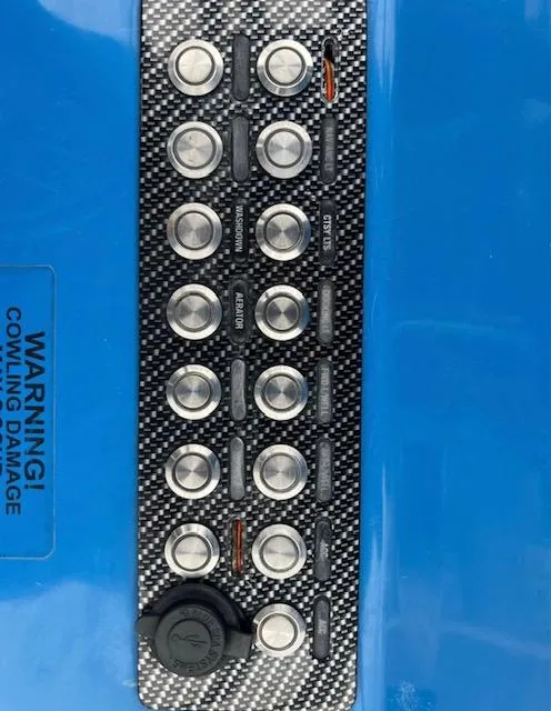 Slide: The Image of Control panel of 2019 Blue Wave 2800 Pure Bay boat with multiple buttons. - 15