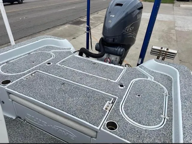 Slide: The Image of 2019 Blue Wave 2800 Pure Bay boat with Yamaha outboard motor, featuring spacious deck layout. - 8