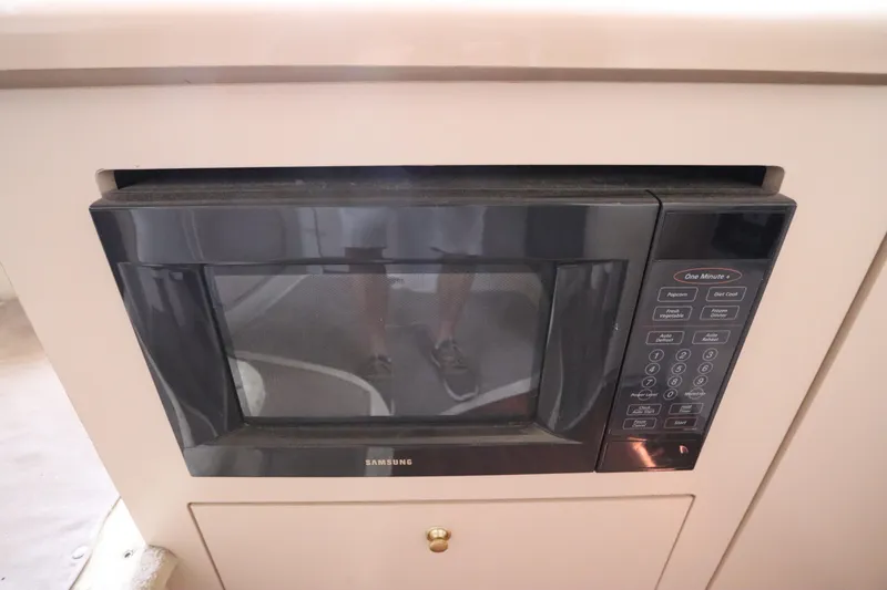 Slide: The Image of Built-in Samsung microwave in 1999 Cruisers Yachts 3750 Motoryacht kitchen area. - 32