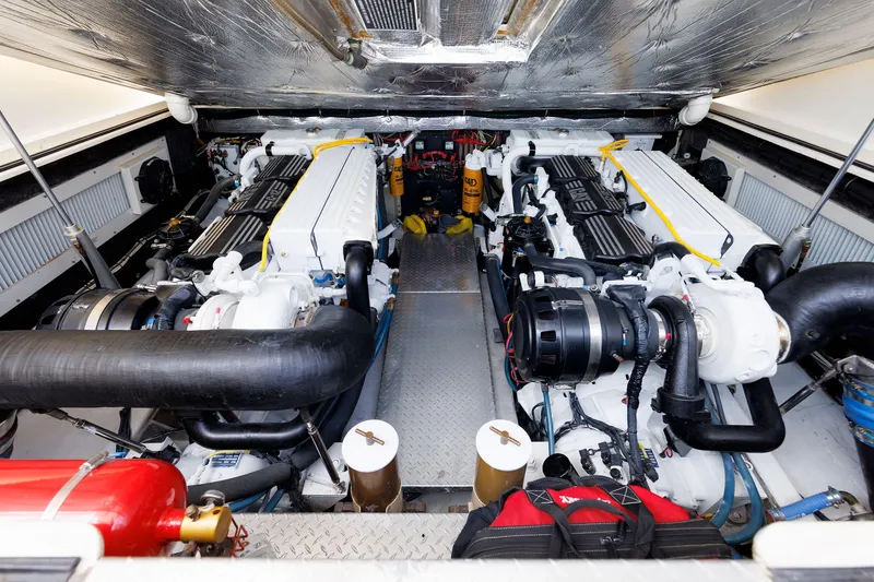 Slide: The Image of Engine room of 2002 Albemarle 41 Express Fisherman with dual engines and equipment. - 43