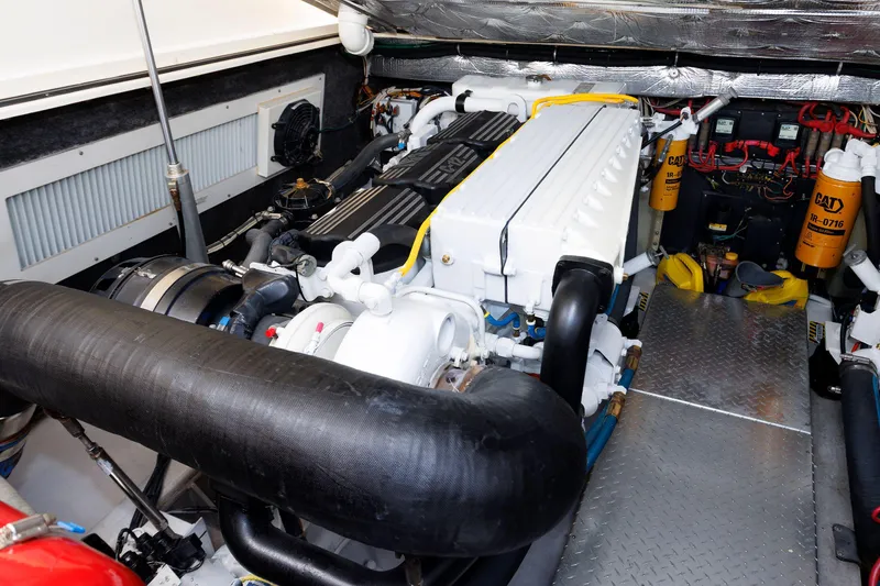 Slide: The Image of Engine room of 2002 Albemarle 41 Express Fisherman boat, showcasing machinery and components. - 45