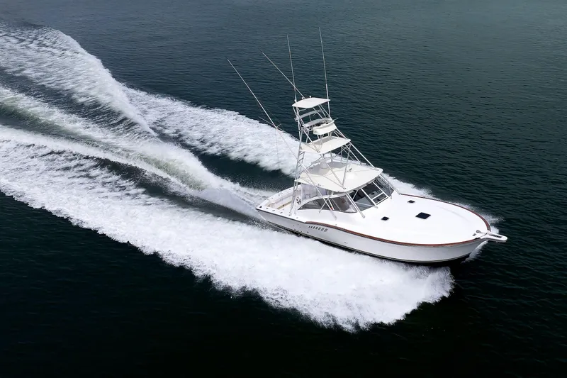 Slide: The Image of 2002 Albemarle 41 Express Fisherman cruising on open water. - 47