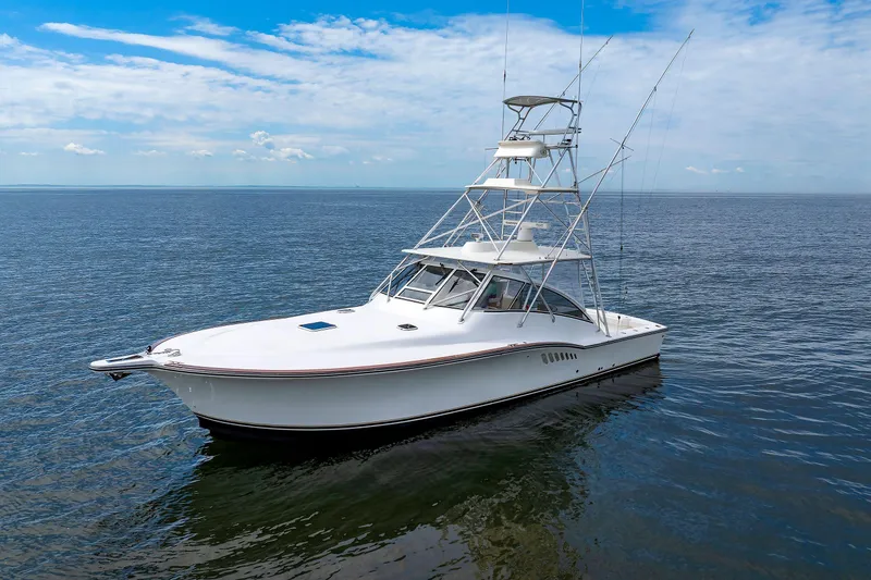 Slide: The Image of 2002 Albemarle 41 Express Fisherman boat on calm ocean waters. - 6