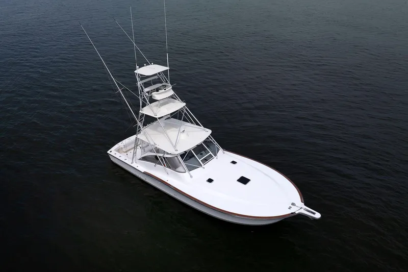 Slide: The Image of 2002 Albemarle 41 Express Fisherman boat on calm water, aerial view. - 7