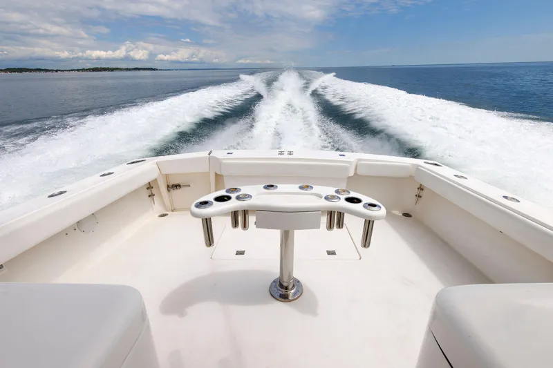 Slide: The Image of Albemarle 41 Express Fisherman 2002 cruising on open water, leaving a wake behind. - 8