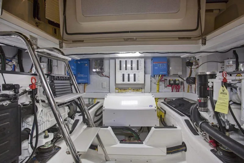 Slide: The Image of 2025 Sabre 45 Salon Express engine room with advanced electrical systems and equipment. - 8