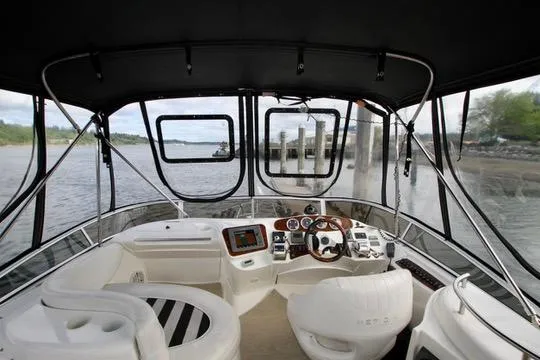 Slide: The Image of Interior view of 2006 Meridian 341 Sedan boat cockpit with steering wheel and navigation equipment. - 22