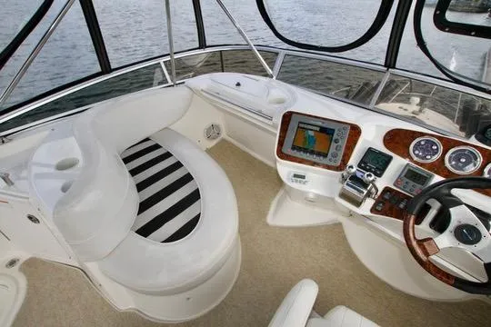 Slide: The Image of 2006 Meridian 341 Sedan cockpit with modern navigation system and plush seating. - 23