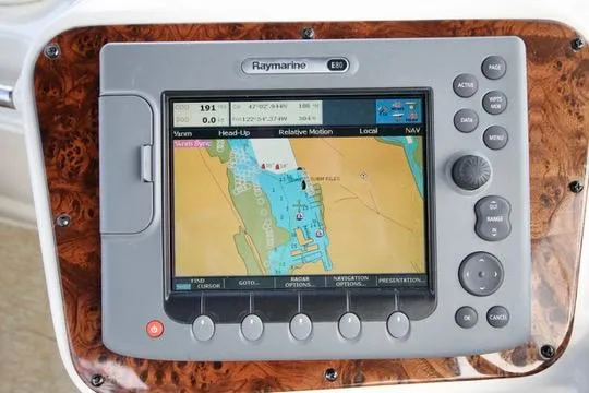 Slide: The Image of Raymarine E80 navigation display on 2006 Meridian 341 Sedan yacht dashboard. - 26