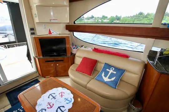 Slide: The Image of Interior of 2006 Meridian 341 Sedan yacht with cozy seating and nautical decor. - 39