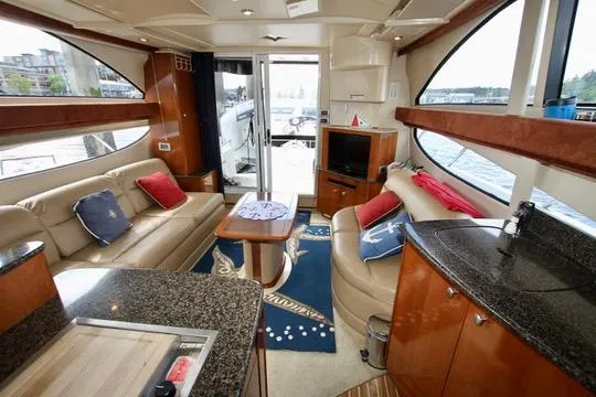 Slide: The Image of Luxurious interior of a 2006 Meridian 341 Sedan yacht with elegant seating and modern amenities. - 40