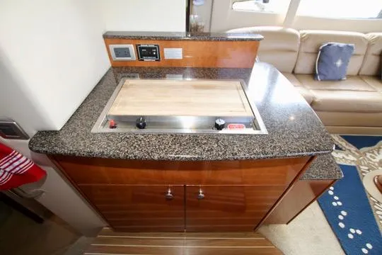 Slide: The Image of 2006 Meridian 341 Sedan yacht interior with granite countertop and built-in stove. - 46