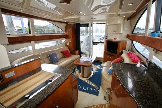 Slide: The Image of Luxurious interior of a 2006 Meridian 341 Sedan yacht with elegant furnishings and modern amenities. - 48