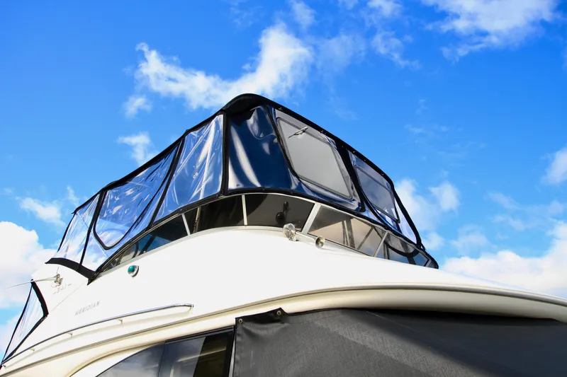 Slide: The Image of 2006 Meridian 341 Sedan yacht against a bright blue sky. - 8