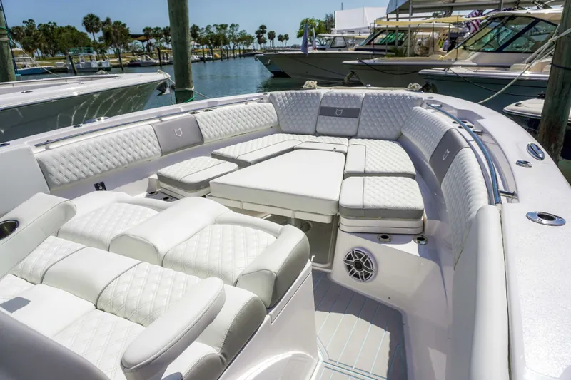 Slide: The Image of Luxurious seating area on 2026 Sea Fox 368 Commander boat, docked at marina. - 15