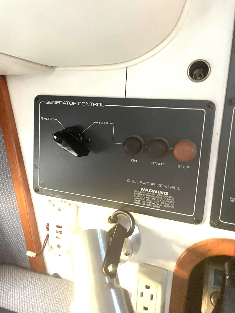 Slide: The Image of Generator control panel on a 1990 Tiara Yachts 3100 Open boat. - 19