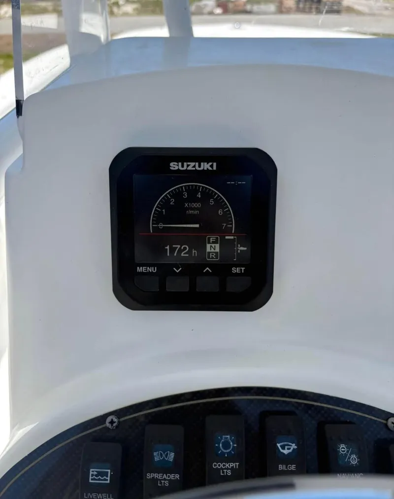 Slide: The Image of Dashboard of a 2021 Savannah SS21 boat with Suzuki display. - 10