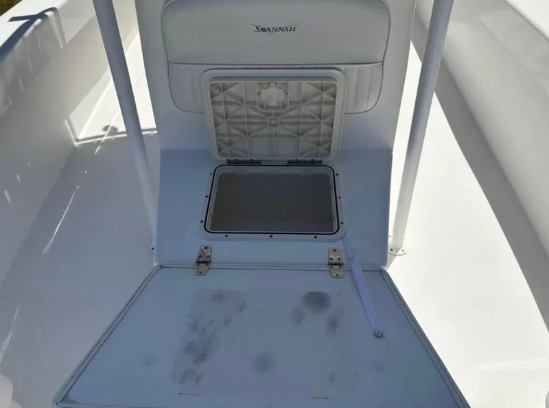 Slide: The Image of 2021 Savannah SS21 boat storage compartment with open hatch, showcasing interior details. - 5