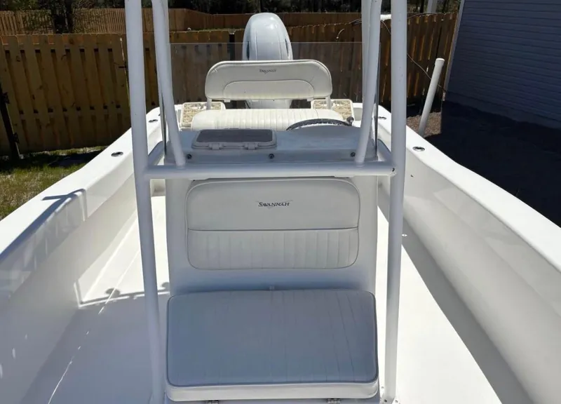 Slide: The Image of 2021 Savannah SS21 boat interior with white seating and console. - 6