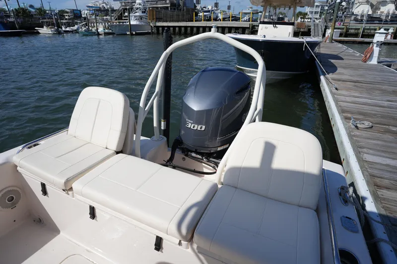 Slide: The Image of 2016 Grady-White 251 Coastal Explorer boat with 300 HP engine at dock. - 14