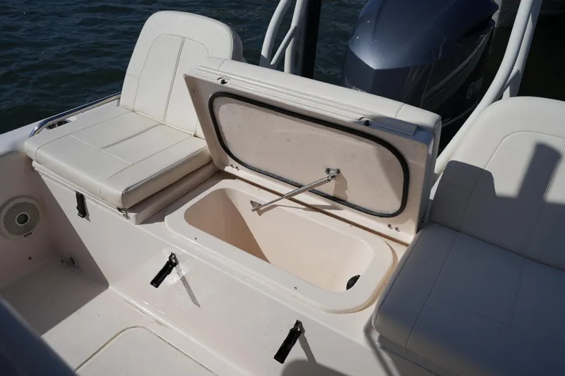Slide: The Image of 2016 Grady-White 251 Coastal Explorer boat with open storage compartment. - 15