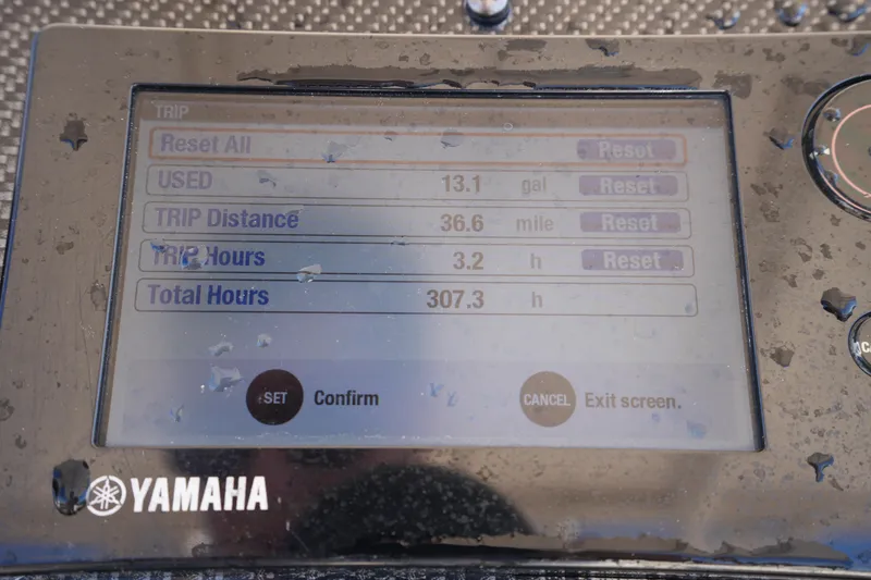 Slide: The Image of Yamaha display showing trip data: 13.1 gallons used, 36.6 miles, 3.2 hours, 307.3 total hours. - 19