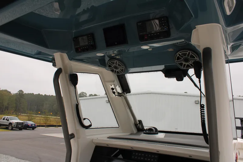 Slide: The Image of 2024 Solace 32 CS boat interior with electronic controls and speakers. - 28