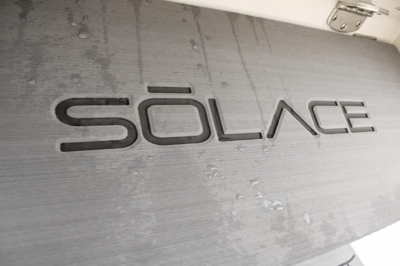 Slide: The Image of Solace 32 CS 2024 logo on textured surface with water droplets. - 39