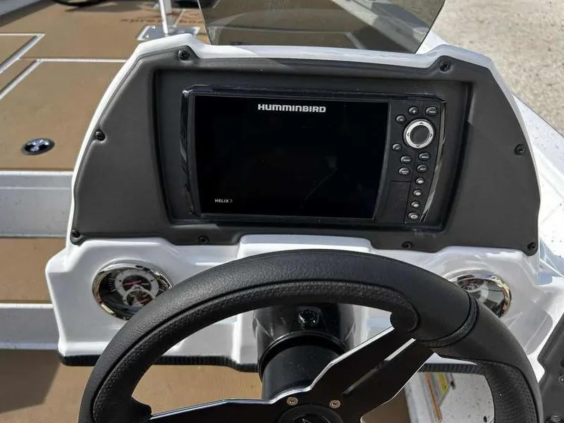 Slide: The Image of Steering console of 2025 Xpress H18B boat with Humminbird Helix 7 fishfinder. - 15