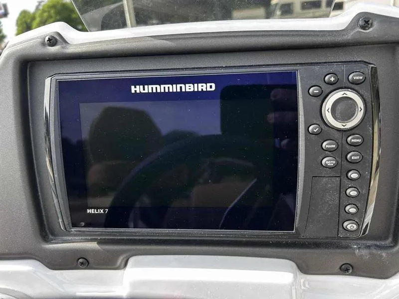 Slide: The Image of Humminbird Helix 7 fish finder on Xpress H18B 2025 boat dashboard. - 16