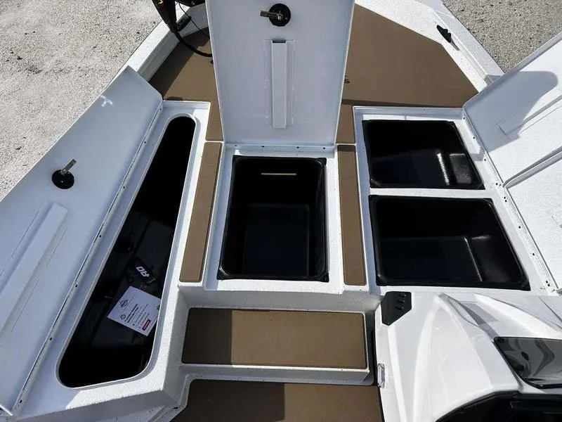 Slide: The Image of 2025 Xpress H18B boat storage compartments with open hatches, showcasing ample space and organization. - 20