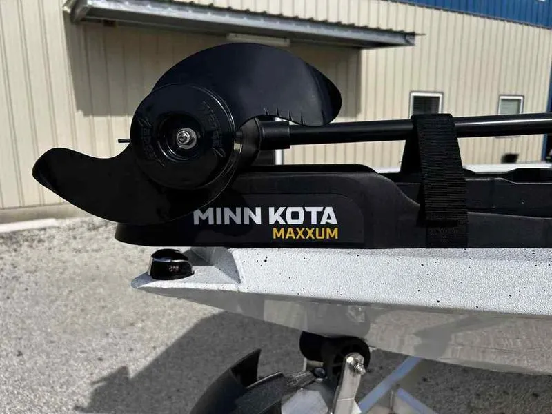 Slide: The Image of Minn Kota Maxxum motor on 2025 Xpress H18B boat, close-up view. - 22