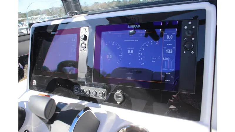 Slide: The Image of Dashboard of 2025 Crevalle 26 HCO boat with Simrad displays. - 11