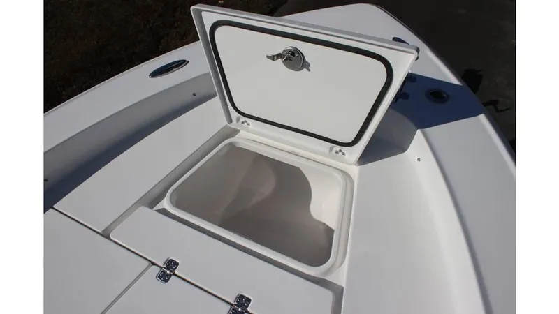 Slide: The Image of Open storage compartment on 2025 Crevalle 26 HCO boat deck. - 7