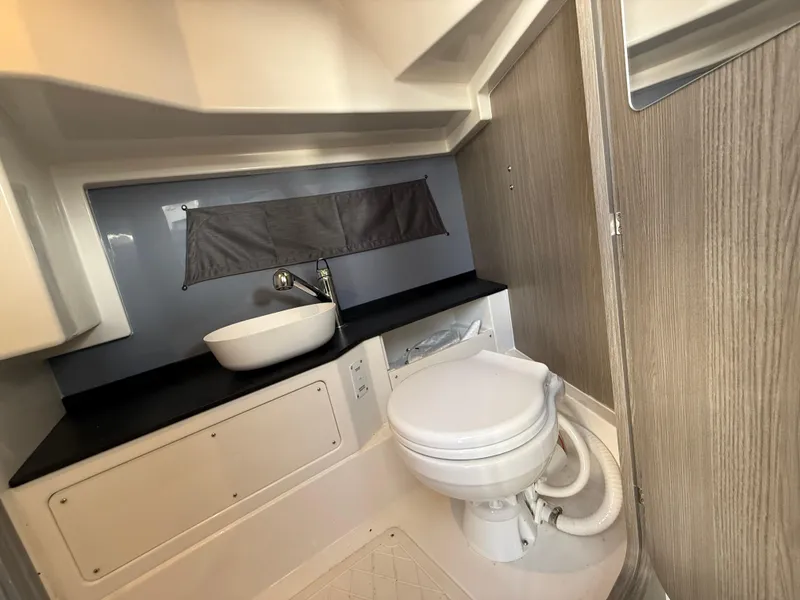 Slide: The Image of Modern bathroom in 2025 Navan C30, featuring sleek sink and compact toilet design. - 12