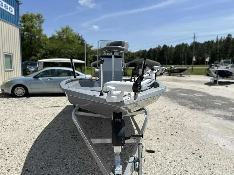 Slide: The Image of 2025 Xpress H190B boat on trailer in outdoor lot, sunny day. - 4