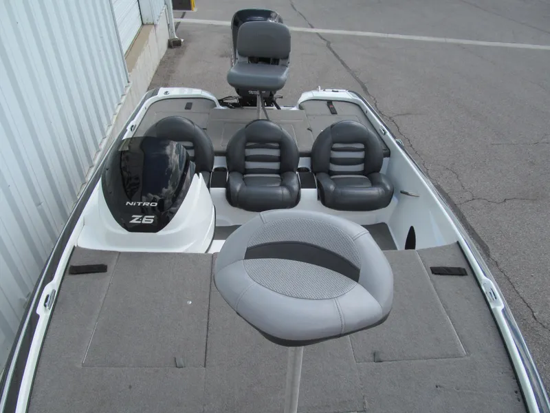 Slide: The Image of 2011 Nitro Z-6 boat interior with gray seating and spacious deck. - 10