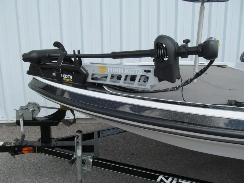 Slide: The Image of 2011 Nitro Z-6 boat with Minn Kota Fortrex trolling motor on trailer. - 12