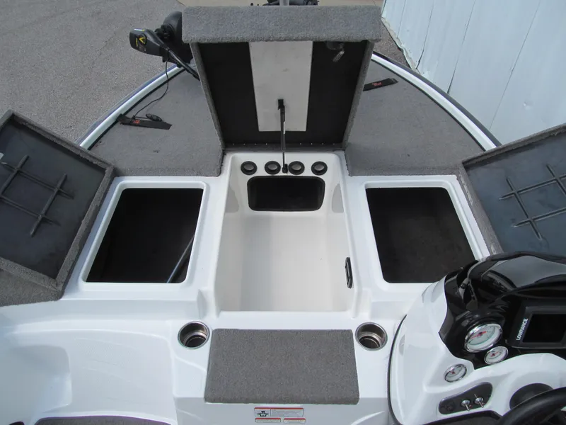 Slide: The Image of 2011 Nitro Z-6 boat storage compartments and control panel. - 8