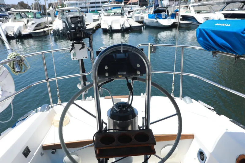 Slide: The Image of Cockpit view of 1988 Catalina 36 sailboat docked in a marina. - 30