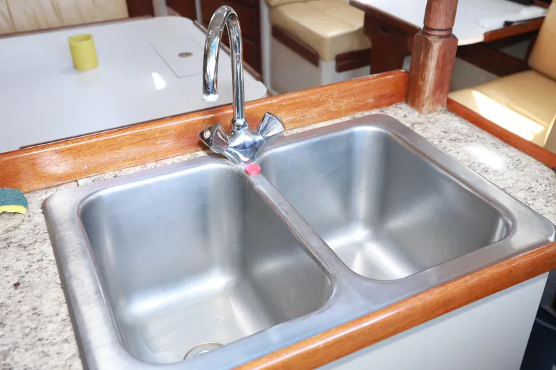 Slide: The Image of Double stainless steel sink in 1988 Catalina 36 yacht kitchen. - 34