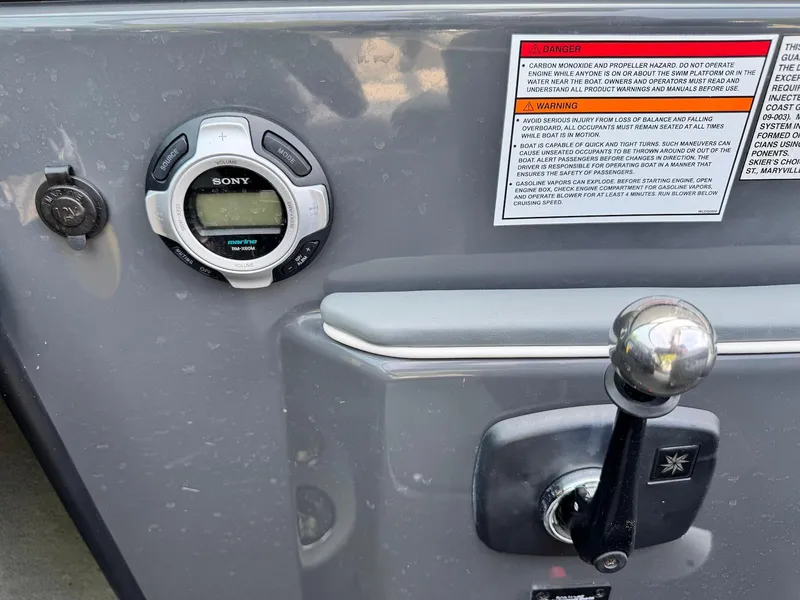 Slide: The Image of 2014 Moomba Mondo dashboard with Sony stereo and control lever. - 18