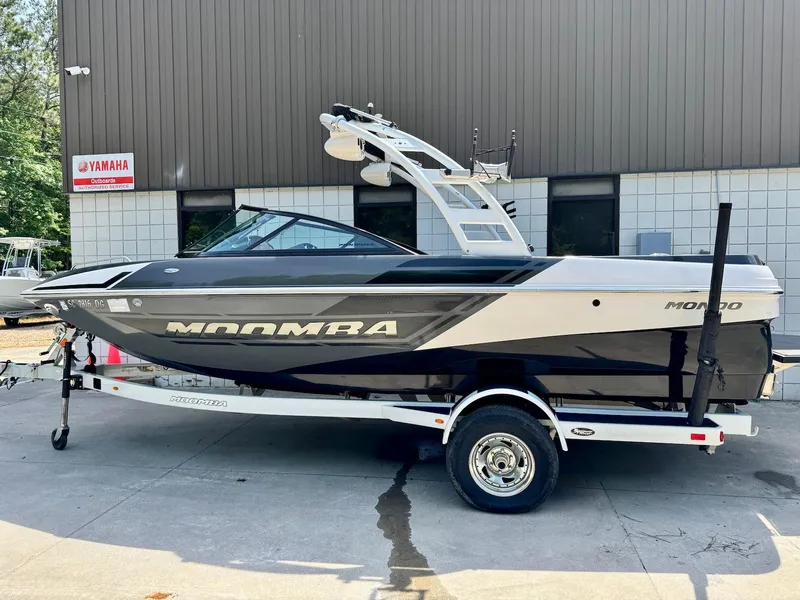 Slide: The Image of 2014 Moomba Mondo boat on trailer, parked outside a Yamaha dealership. - 2