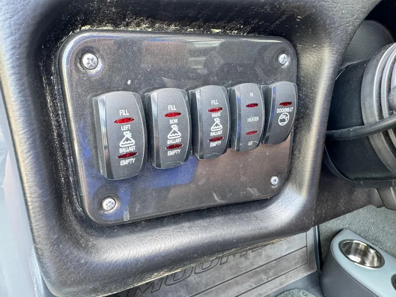 Slide: The Image of 2014 Moomba Mondo ballast control panel with switches for filling and emptying. - 29