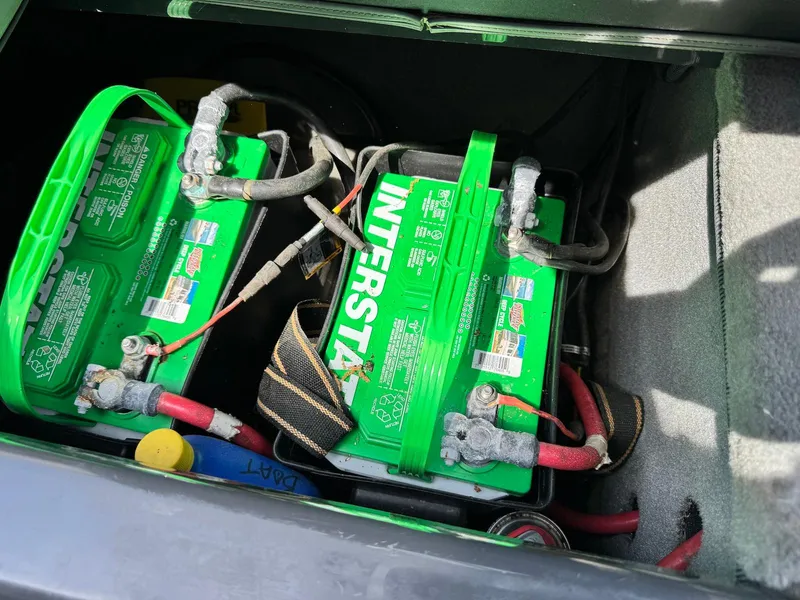 Slide: The Image of Two Interstate batteries in a 2014 Moomba Mondo boat compartment. - 31