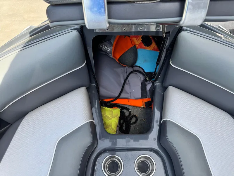 Slide: The Image of 2014 Moomba Mondo boat storage with life jackets and gear. - 32