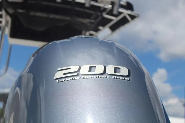 Slide: The Image of Outboard motor with "200 Variable Camshaft Timing" on a 2011 Key West 216 Bay Reef boat. - 10