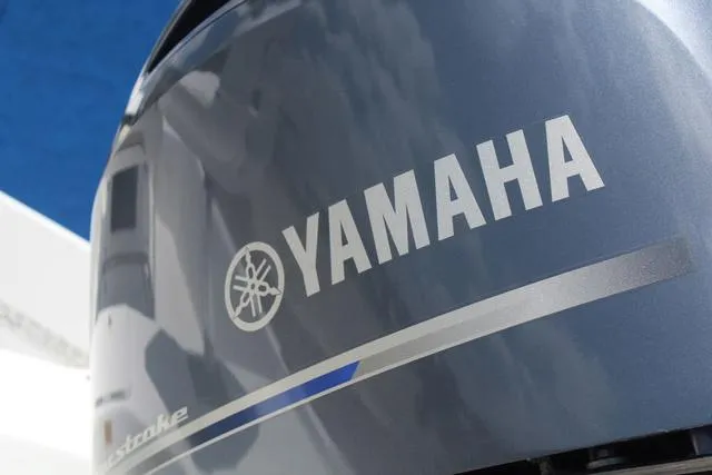 Slide: The Image of Yamaha outboard motor on 2011 Key West 216 Bay Reef boat. - 11