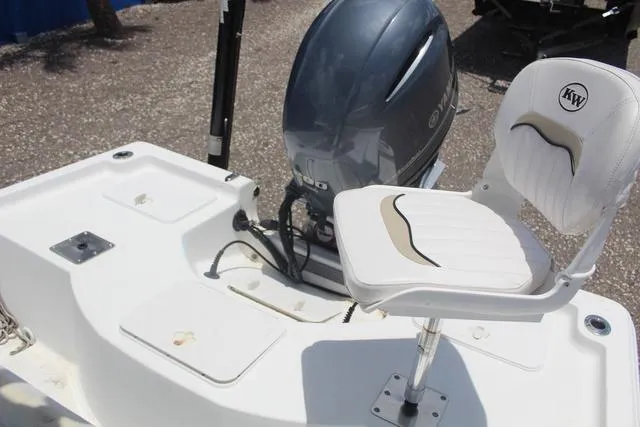 Slide: The Image of 2011 Key West 216 Bay Reef boat with Yamaha outboard motor and swivel seat. - 21